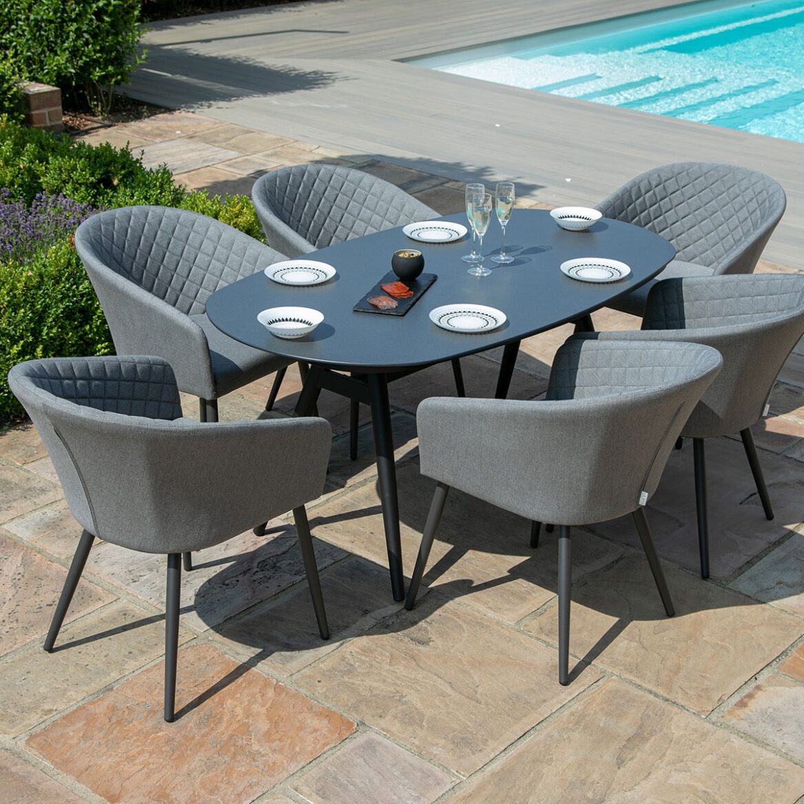 Ambition All Weather Fabric Oval Six seat Garden Dining Set with Spray Stone Dining Table - Grey