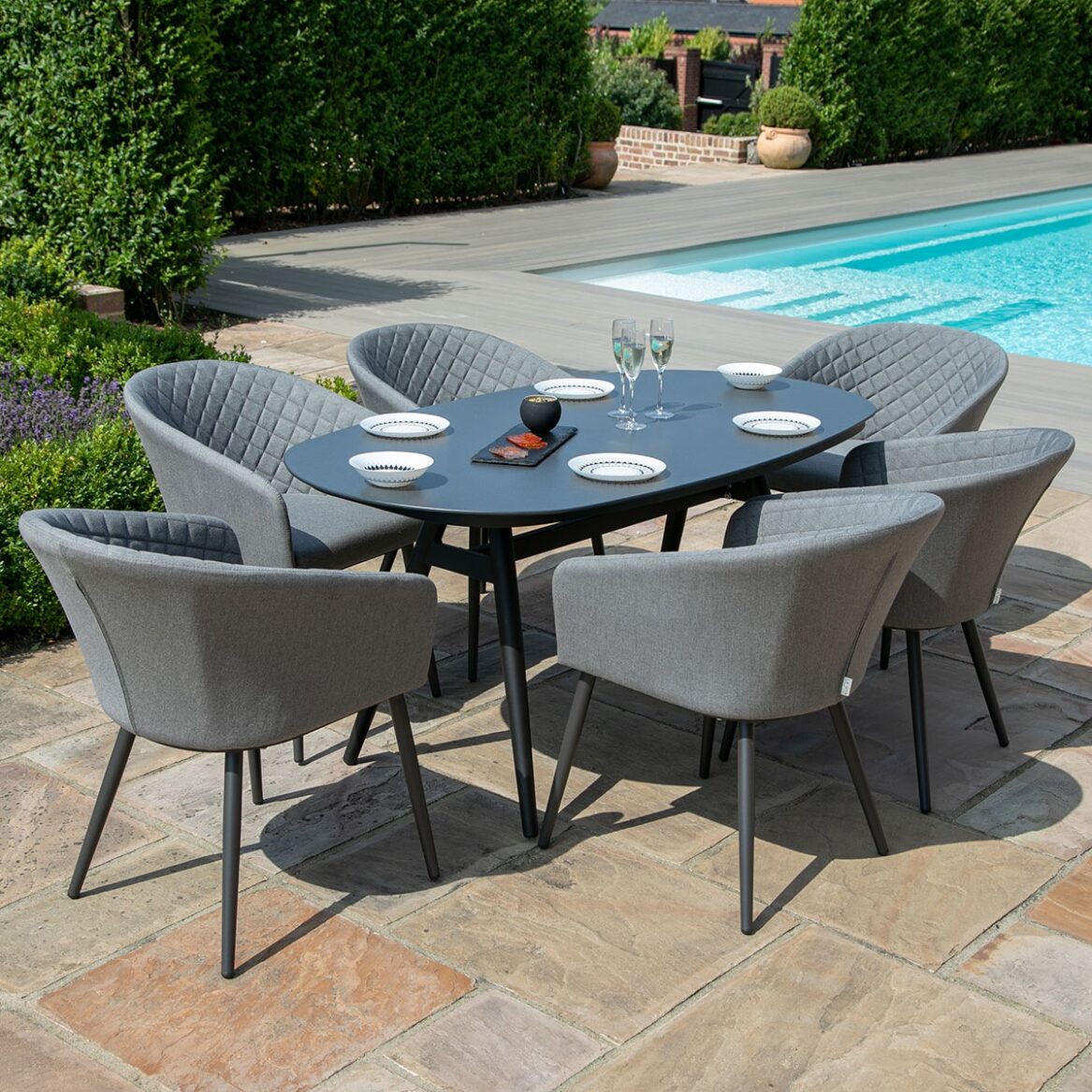 Ambition All Weather Fabric Oval Six seat Garden Dining Set with Spray Stone Dining Table - Grey