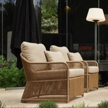 Skyline Design Calyxto Lounging Outdoor Rattan Armchair | Natural Honey Colour Rattan Finish | Luxury Commercial Outdoor Sofa Seating | Posh Garden Furniture Centre 
