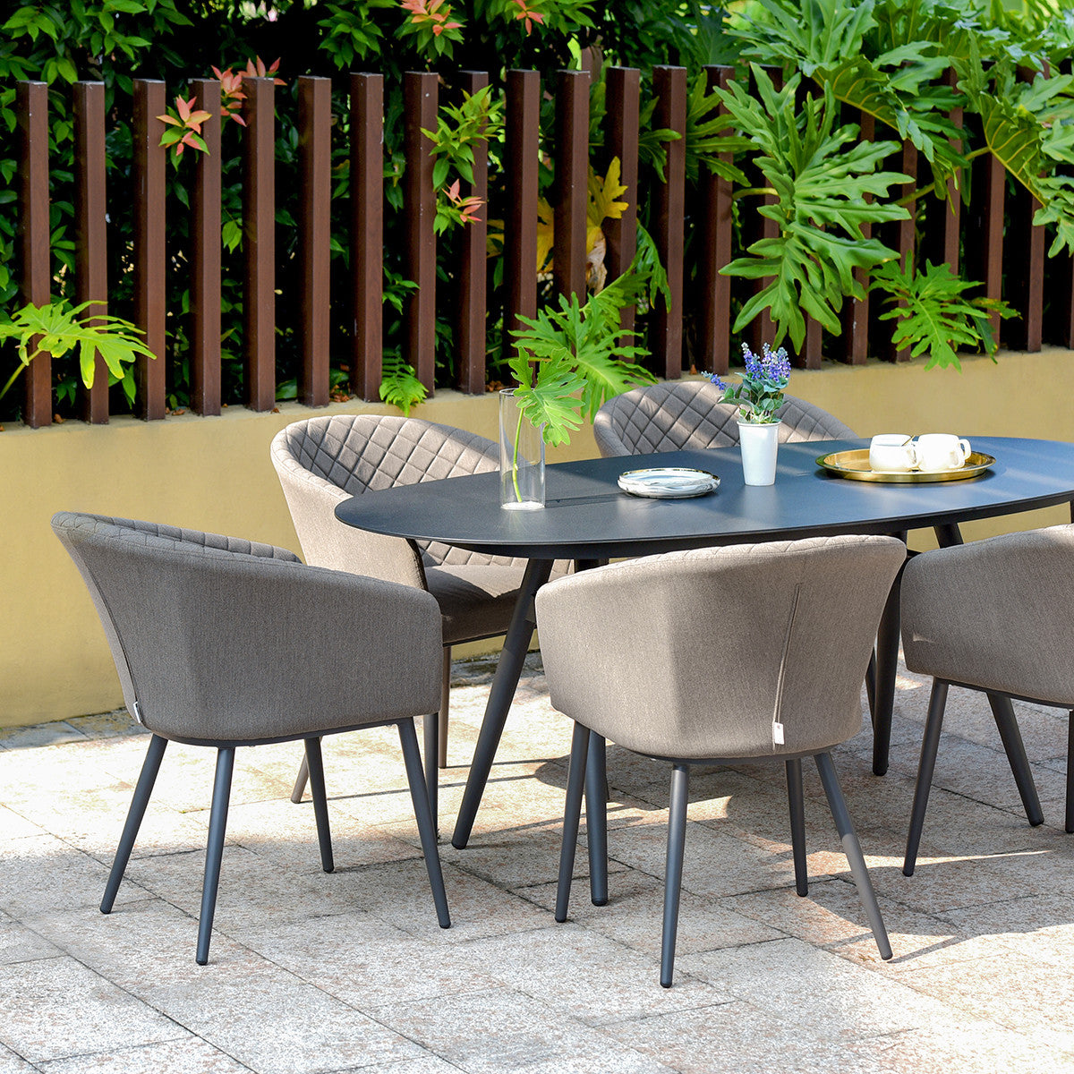 Ambition All Weather Fabric Oval Six seat Garden Dining Set with Spray Stone Dining Table - Taupe