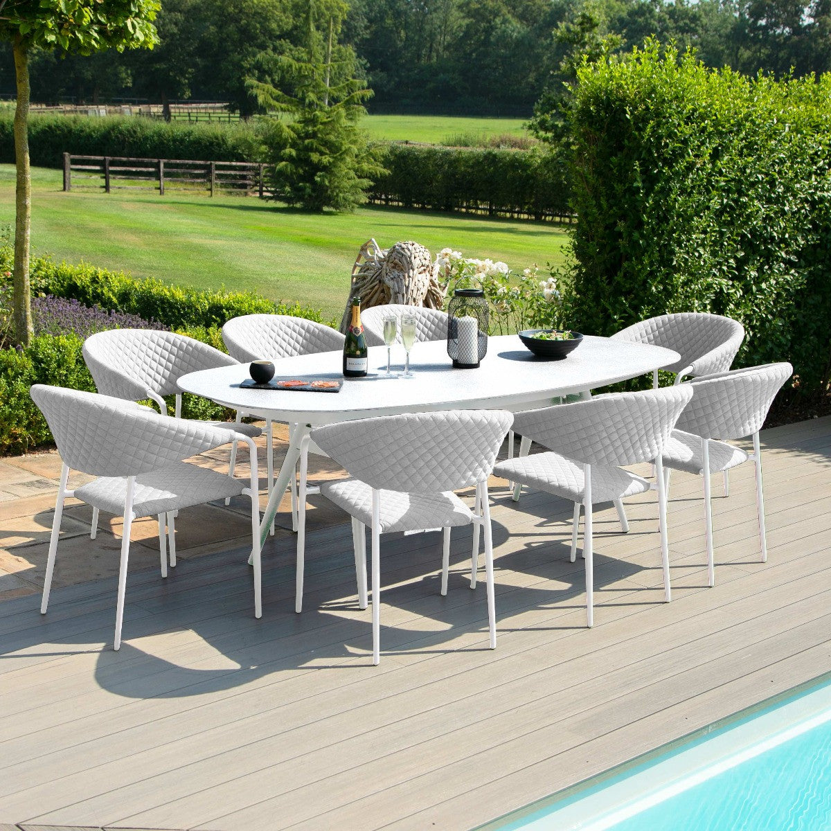 Pebble All weather Eight Seat Oval Garden Dining Set Lead Chine