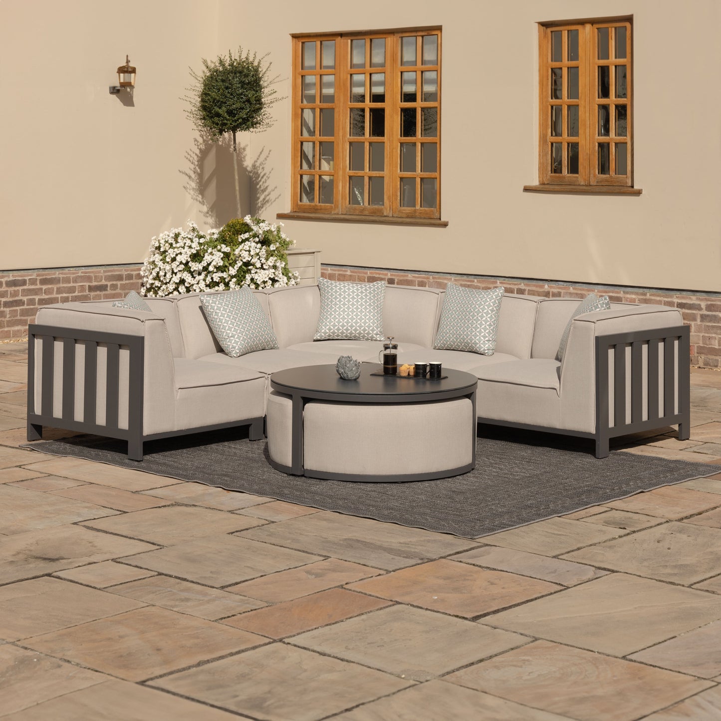 Ibiza Small Modern Outdoor Corner Sofa Set with Round Coffee Table with Stools