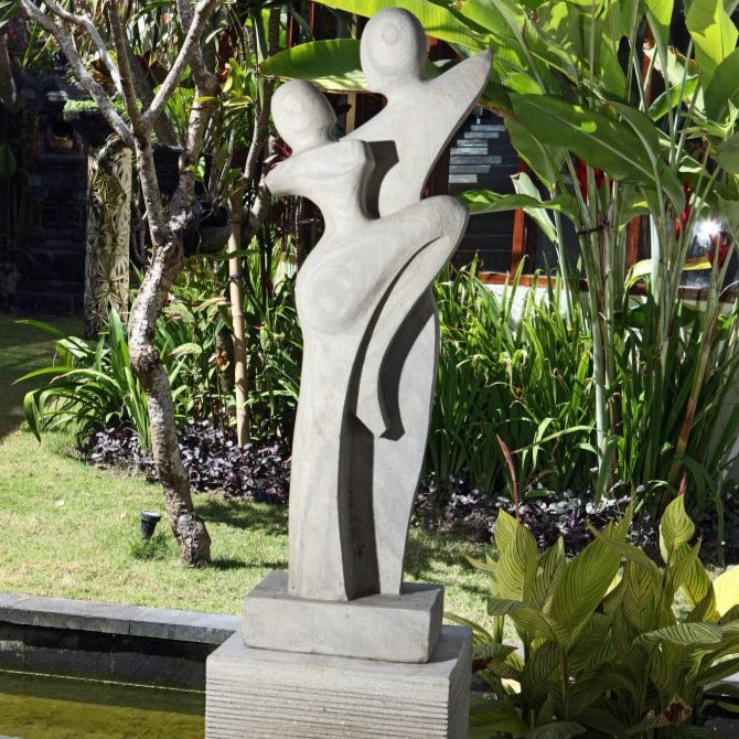Dancers stone garden sculpture with plinth